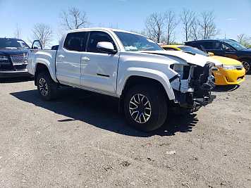 2023 toyota tacoma Double Cab in White- Front Three-Quarter View - BidGoDrive Inventory