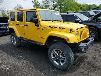 2015 jeep wrangler UNLIMITED RUBICON in Yellow- Front Three-Quarter View - BidGoDrive Inventory