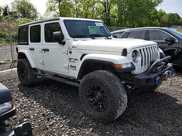 2019 jeep wrangler UNLIMITED SAHARA in White- Front Three-Quarter View - BidGoDrive Inventory