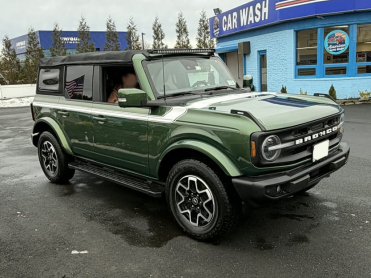 Salvage 2022 Ford Bronco OUTER BANK - Green Convertible - Front Three-Quarter View