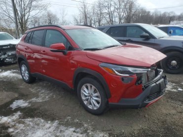 Salvage 2024 Toyota Corolla Cross Le - Red SUV - Front Three-Quarter View