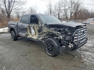 Salvage 2025 Toyota Tundra LIMITED HV - Gray PickUp - Front Three-Quarter View