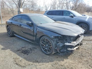 Salvage 2025 BMW M8 COMPETITION - Black Sedan - Front Three-Quarter View