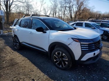 Salvage 2026 Nissan Kicks SV - White Van - Front Three-Quarter View