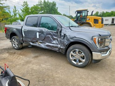 Salvage 2023 FORD F150 Lariat - Gray PickUp - Front Three-Quarter View