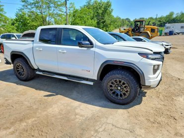 Salvage 2024 GMC Canyon AT4 - White PickUp - Front Three-Quarter View