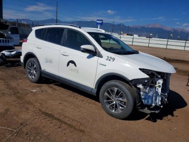 Salvage 2018 Toyota Rav4 HYBRID LE - Gray SUV - Front Three-Quarter View