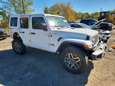 Salvage 2025 Jeep Wrangler SAHARA - White SUV - Front Three-Quarter View