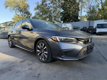 Salvage 2024 HONDA CIVIC EX-L - Gray Sedan - Front Three-Quarter View
