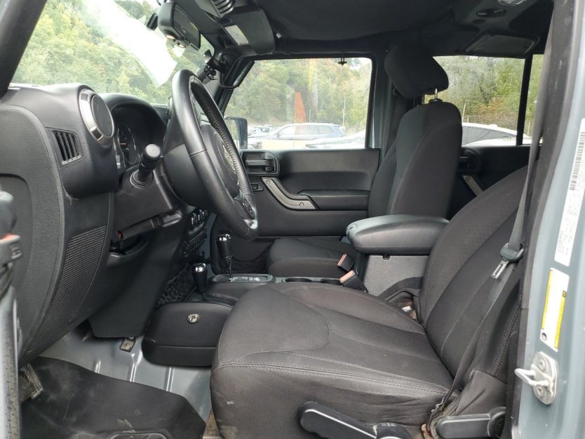 Salvage 2015 Jeep Wrangler Unlimited Sport