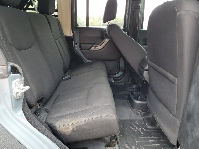 Salvage 2015 Jeep Wrangler Unlimited Sport