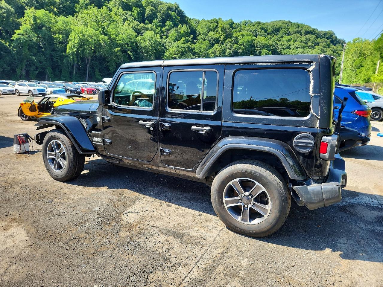 Salvage 2023 Jeep Wrangler Sahara