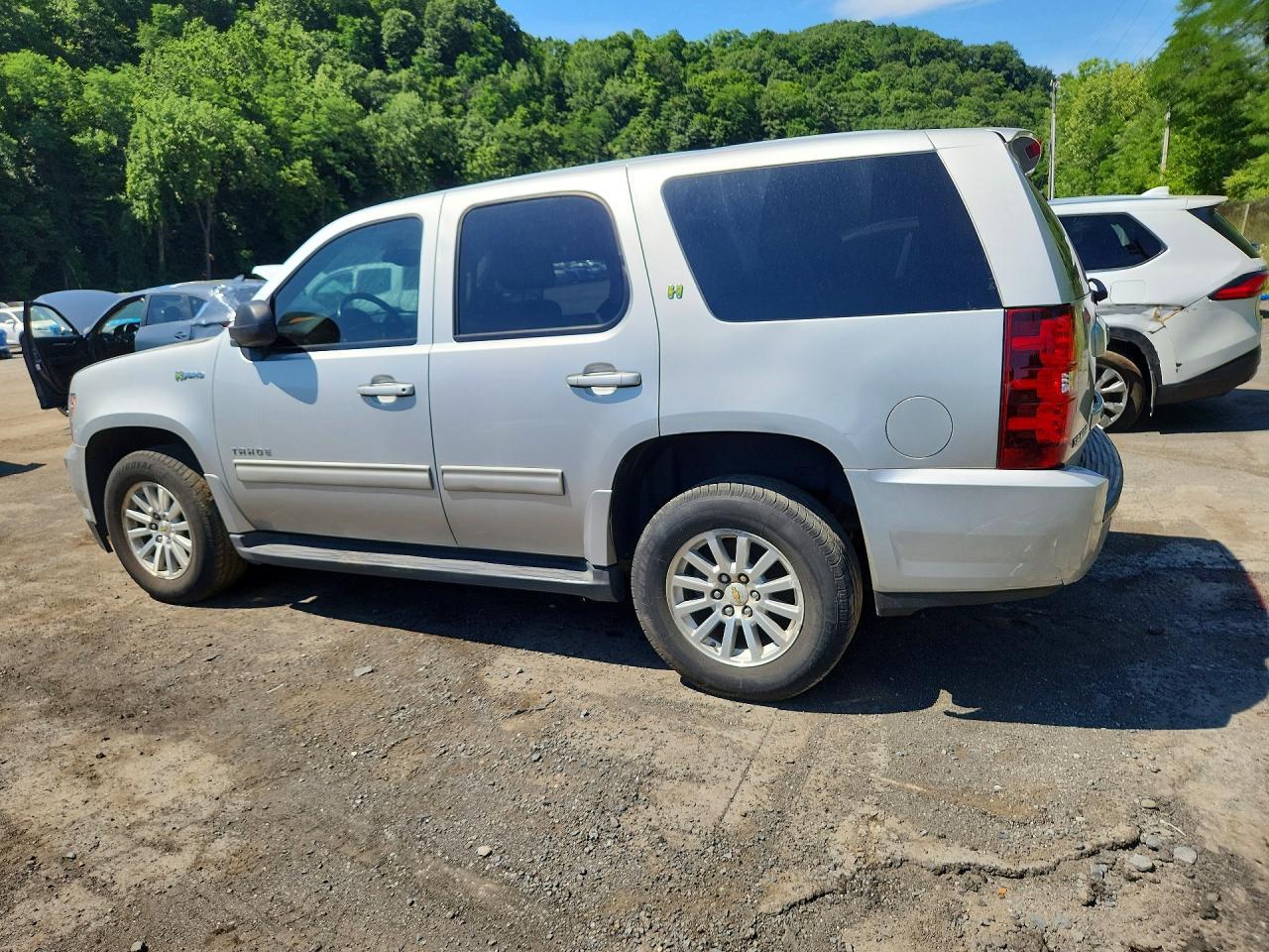 Salvage 2011 Chevrolet Tahoe Hybrid