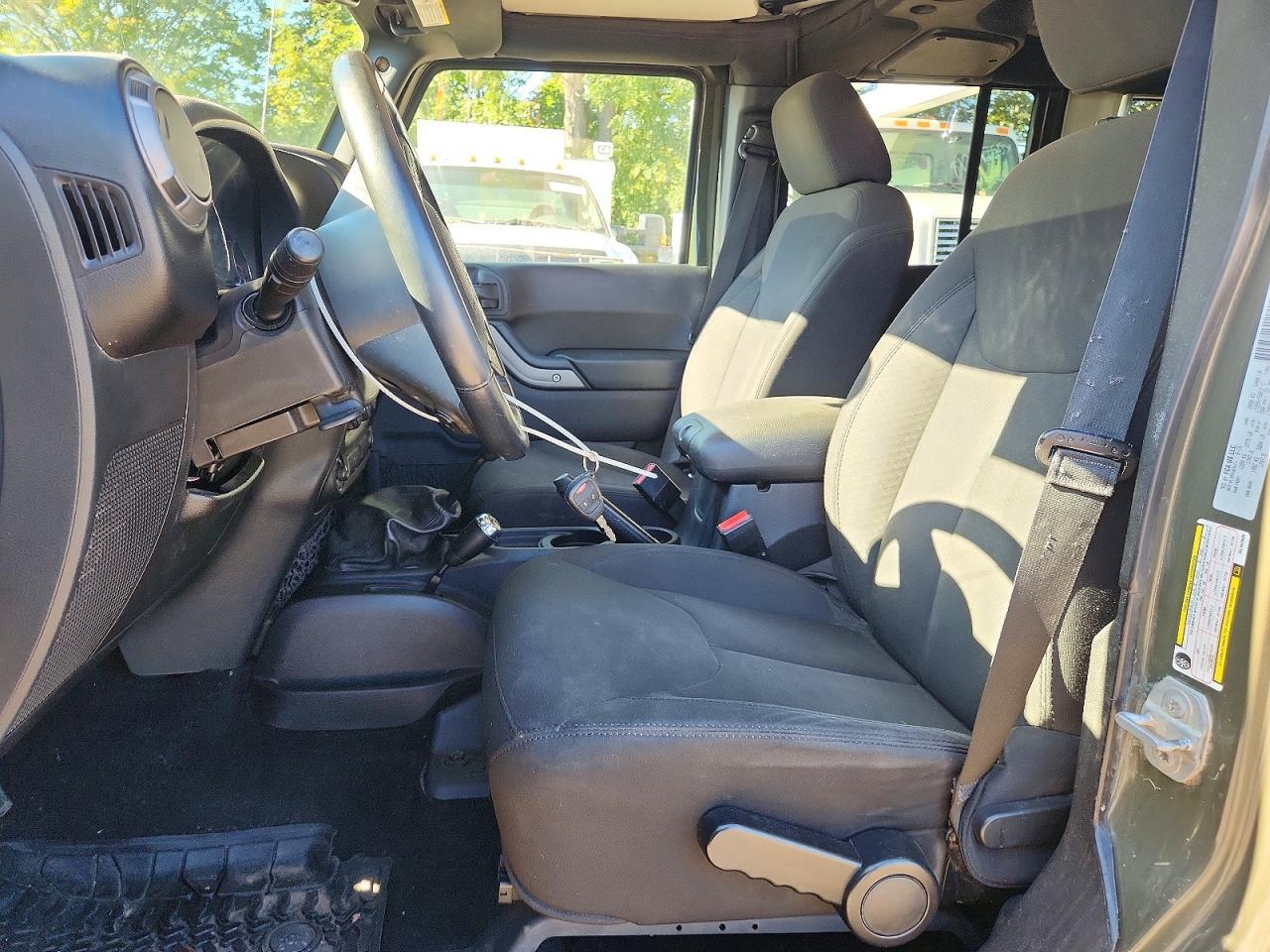 Salvage 2016 Jeep Wrangler Unlimited Sport