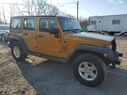 Salvage 2014 Jeep Wrangler UNLIMITED SPORT - Yellow SUV - Front Three-Quarter View