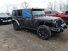 Salvage 2018 Jeep Wrangler UNLIMITED SPORT - Gray SUV - Front Three-Quarter View
