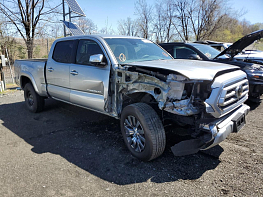 Salvage 2023 Toyota Tacoma Double Cab - Silver PickUp - Front Three-Quarter View