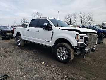2022 Ford F350 PLATINUM in White - Front Three-Quarter View - BidGoDrive Inventory