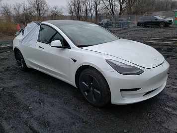 2023 Tesla Model 3  in White - Front Three-Quarter View - BidGoDrive Inventory