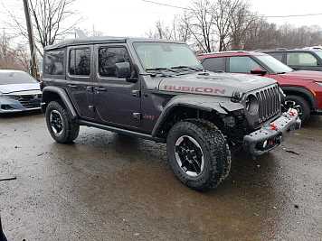 2021 jeep wrangler Unlimited Rubicon in Charcoal- Front Three-Quarter View - BidGoDrive Inventory