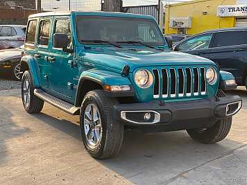 2019 jeep wrangler UNLIMITED SAHARA in Blue- Front Three-Quarter View - BidGoDrive Inventory