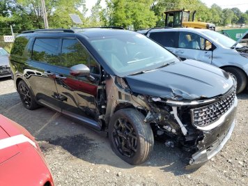 2025 kia carnival SX in Black - Front Three-Quarter View - BidGoDrive Inventory