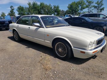 1995 jaguar xj12  in White - Front Three-Quarter View - BidGoDrive Inventory