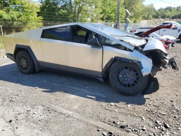 2024 tesla cybertruck  in Gray - Front Three-Quarter View - BidGoDrive Inventory