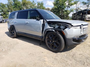 2024 rivian r1s  in Gray - Front Three-Quarter View - BidGoDrive Inventory