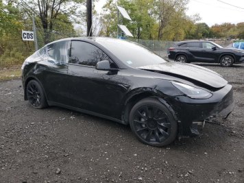 2023 tesla model-y  in Black - Front Three-Quarter View - BidGoDrive Inventory