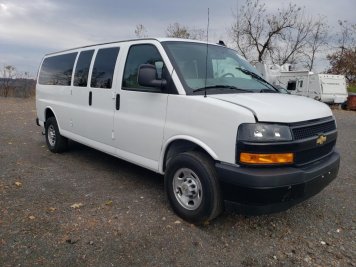 2024 chevrolet express  in White - Front Three-Quarter View - BidGoDrive Inventory