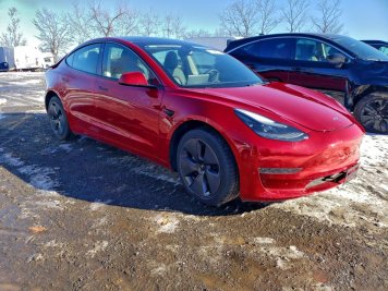 2023 tesla model-3  in Red - Front Three-Quarter View - BidGoDrive Inventory