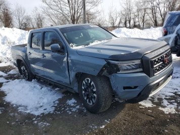 2024 nissan frontier PRO-X in Green - Front Three-Quarter View - BidGoDrive Inventory