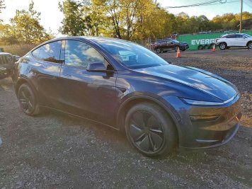 2026 tesla model-y  in Black - Front Three-Quarter View - BidGoDrive Inventory