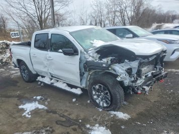 2025 chevrolet colorado Z71 in White - Front Three-Quarter View - BidGoDrive Inventory