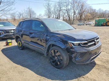 2024 volkswagen taos  in Black - Front Three-Quarter View - BidGoDrive Inventory