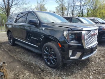 2024 gmc yukon-xl DENALI in Black - Front Three-Quarter View - BidGoDrive Inventory