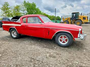 1961 studebaker hawk  in Red - Front Three-Quarter View - BidGoDrive Inventory