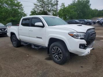 2022 toyota tacoma TRD SPORT in White - Front Three-Quarter View - BidGoDrive Inventory