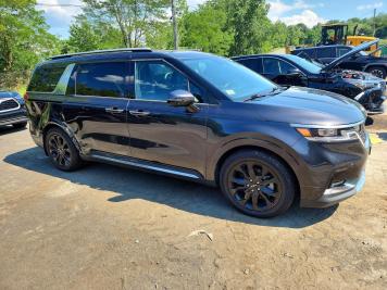 2023 kia carnival SX PRESTIGE in Black - Front Three-Quarter View - BidGoDrive Inventory