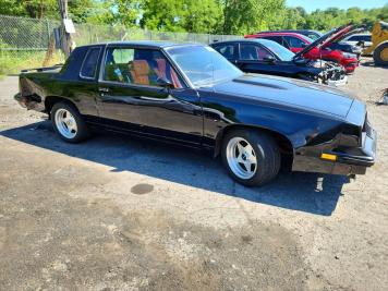 1983 oldsmobile cutlass CALAIS in Black - Front Three-Quarter View - BidGoDrive Inventory