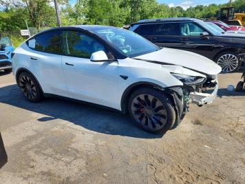 2022 tesla model-y  in White - Front Three-Quarter View - BidGoDrive Inventory