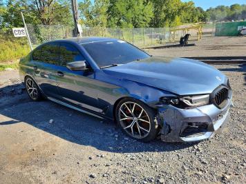 2023 bmw m550xi  in Blue - Front Three-Quarter View - BidGoDrive Inventory