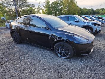 2025 tesla model-y  in Black - Front Three-Quarter View - BidGoDrive Inventory