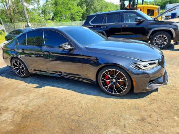 2023 bmw m5 COMPETITON in Black - Front Three-Quarter View - BidGoDrive Inventory