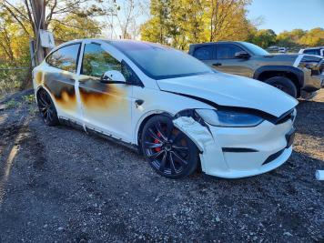 2024 tesla model-x  in White - Front Three-Quarter View - BidGoDrive Inventory