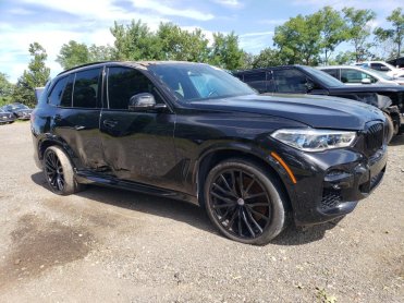 Salvage 2023 BMW X5 M50I - Black SUV - Front Three-Quarter View