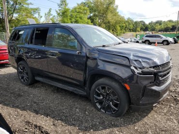 Salvage 2023 Chevrolet Tahoe RST - Black SUV - Front Three-Quarter View