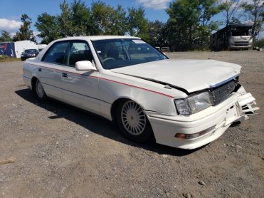 Salvage 1995 Toyota Crown  - White Sedan - Front Three-Quarter View