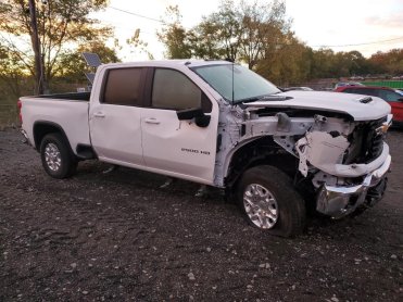 Salvage 2025 Chevrolet Silverado  - White PickUp - Front Three-Quarter View